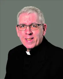 FATHER CHARLES MCGINNIS JR.